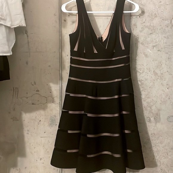 Black JS collections cocktail dress with sheer-over inner nude slip. - Picture 1 of 5